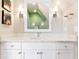 Vanity with marble countertop and a large mirror at 2188 Niles Pl, Atlanta, GA 30324