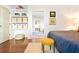 Bright bedroom with hardwood floors and built-in shelves at 2188 Niles Pl, Atlanta, GA 30324