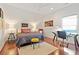 Bedroom with a queen bed, home office and hardwood floors at 2188 Niles Pl, Atlanta, GA 30324