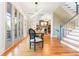Bright dining room with hardwood floors and view to the kitchen at 2188 Niles Pl, Atlanta, GA 30324