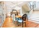 Bright dining room with hardwood floors and a farmhouse table at 2188 Niles Pl, Atlanta, GA 30324