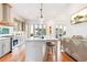 Modern kitchen with island, hardwood floors and breakfast bar at 2188 Niles Pl, Atlanta, GA 30324