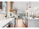 Modern kitchen with island, hardwood floors and french doors at 2188 Niles Pl, Atlanta, GA 30324