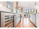 Modern kitchen with wine cooler and hardwood floors at 2188 Niles Pl, Atlanta, GA 30324