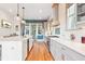 Modern kitchen with island, stainless steel appliances, and hardwood floors at 2188 Niles Pl, Atlanta, GA 30324