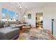 Spacious living room with sectional sofa and large windows at 2188 Niles Pl, Atlanta, GA 30324