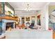 Spacious living room with fireplace, large windows and comfortable seating at 2188 Niles Pl, Atlanta, GA 30324