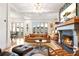 Light and airy living room with a cozy fireplace and ample natural light at 2188 Niles Pl, Atlanta, GA 30324