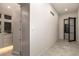 Modern hallway with sleek tile floors and hidden storage at 2746 Emerald Dr, Jonesboro, GA 30236