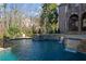 Amazing custom pool with several waterfalls and mature landscaping at 4755 Riverview Rd, Atlanta, GA 30327