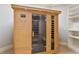 Home sauna with glass door and wooden construction at 4755 Riverview Rd, Atlanta, GA 30327