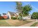 Brick and siding home with a two-car garage and lush green lawn at 80 Keyton Dr, Covington, GA 30016