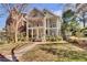 Two-story house with front yard, walkway, and balcony at 935 Piedmont Ave # 201, Atlanta, GA 30309