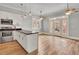 Modern kitchen with stainless steel appliances and hardwood floors at 935 Piedmont Ave # 201, Atlanta, GA 30309