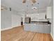 Modern kitchen with island, stainless steel appliances, and hardwood floors at 935 Piedmont Ave # 201, Atlanta, GA 30309