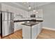 Modern kitchen with stainless steel appliances and hardwood floors at 935 Piedmont Ave # 201, Atlanta, GA 30309