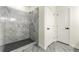 Elegant bathroom features a tiled shower with modern fixtures and a glass enclosure at 3605 Brycewood Dr, Decatur, GA 30034