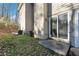 Back exterior showing patio, AC unit, and landscaping at 524 Granite Ridge Pl, Atlanta, GA 30350