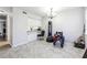 Dining area with kitchen pass-through and hardwood floor at 524 Granite Ridge Pl, Atlanta, GA 30350