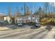 Three-unit building with parking and wooded backdrop at 524 Granite Ridge Pl, Atlanta, GA 30350