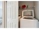Convenient laundry closet with washer and dryer at 524 Granite Ridge Pl, Atlanta, GA 30350