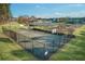 Outdoor basketball court with fencing and green surroundings at 1584 Fernstone Nw Cir, Acworth, GA 30101