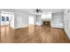 Living room with hardwood floors, fireplace, and built-in shelving at 1584 Fernstone Nw Cir, Acworth, GA 30101