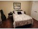 Charming bedroom with hardwood floors, Eiffel Tower bedding, and ample space at 3957 Birdie Dr, Douglasville, GA 30134