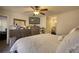 Large main bedroom with dresser and king-size bed at 1638 River Trce, Auburn, GA 30011