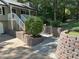 Landscaped yard with retaining walls at 2401 Westland Way, Acworth, GA 30102