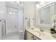 Bathroom featuring a shower-tub combination, toilet and vanity with modern accents at 2125 Fairfax Dr, Alpharetta, GA 30009