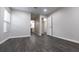 Bright bedroom with dark wood-look floors and en-suite bathroom at 600 Bedfort Dr, Duluth, GA 30096