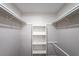 Spacious closet with hanging rods and shelves at 600 Bedfort Dr, Duluth, GA 30096