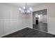 Dining room featuring modern chandelier and view of the living room at 600 Bedfort Dr, Duluth, GA 30096