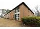 Brick building with green accents and landscaping at 600 Bedfort Dr, Duluth, GA 30096