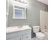 Bathroom with white vanity and bathtub at 6622 Wellington Sq, Norcross, GA 30093