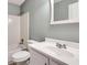 Clean bathroom with white vanity, tub, and shower at 6622 Wellington Sq, Norcross, GA 30093