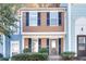 Updated townhome with attractive exterior and landscaping at 6622 Wellington Sq, Norcross, GA 30093