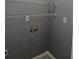 Laundry room with washer/dryer hookups and wire shelving at 6622 Wellington Sq, Norcross, GA 30093