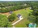 Aerial view showing a house and surrounding landscape at 1300 Snapping Shoals Rd, Mcdonough, GA 30252