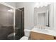 Modern bathroom with a large shower and vanity at 124 Stonehouse Dr, Cumming, GA 30040