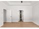 Spacious bedroom with hardwood floors and access to bathroom at 124 Stonehouse Dr, Cumming, GA 30040