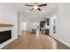 Open concept kitchen with dark cabinetry, island, and stainless steel appliances at 124 Stonehouse Dr, Cumming, GA 30040