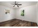 Spacious bedroom with hardwood floors and ceiling fan at 3317 Ward Sw Dr, Atlanta, GA 30354