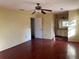 Large main bedroom with hardwood floors and access to bathroom at 1193 Kelton Dr, Stone Mountain, GA 30083