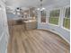 Open-concept kitchen with modern countertops, stainless steel appliances, and custom cabinetry at 2082 Rainbow Dr, Snellville, GA 30039