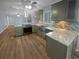 Renovated kitchen with stainless steel appliances, custom backsplash, and lots of countertop space at 2082 Rainbow Dr, Snellville, GA 30039
