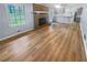 Spacious living room featuring a brick fireplace and large windows at 2082 Rainbow Dr, Snellville, GA 30039