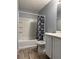 Clean bathroom with shower/tub combo and double vanity at 16103 Waldrop Cv, Decatur, GA 30034