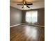 Bright bedroom with gray walls and wood-look flooring at 16103 Waldrop Cv, Decatur, GA 30034